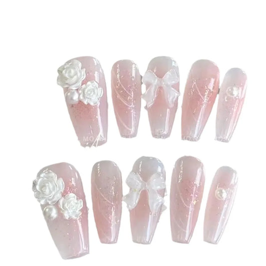 Roze boog verleidelijke en onschuldige lieve meid valse nagels herfst en winter camellia ijs met de hand-dragende nail art blush kunstmatige nagel